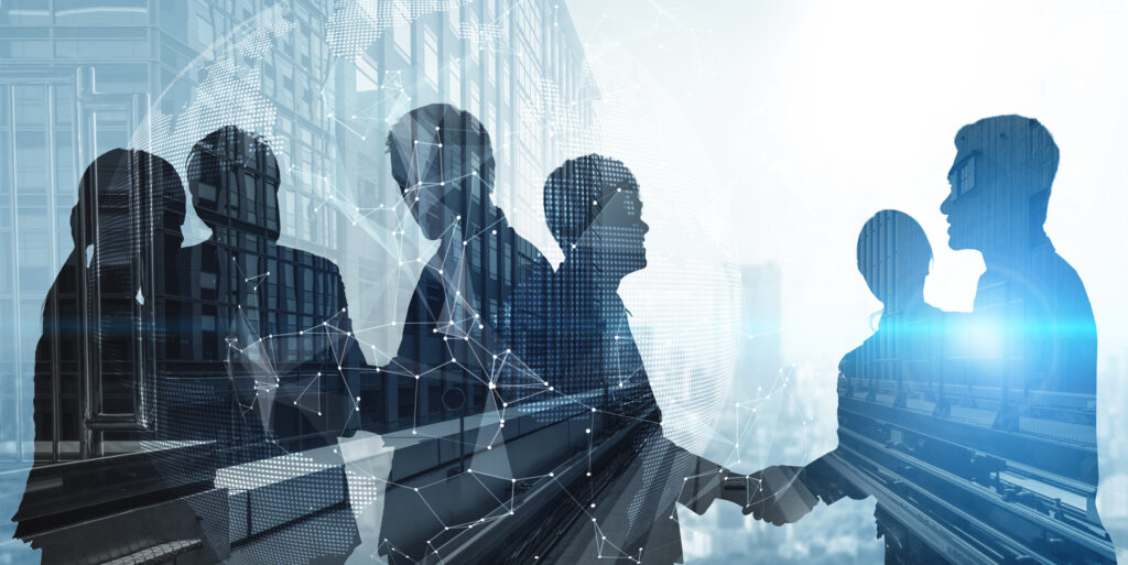 Profissionais de negócios com tecnologia digital, sígnico de parceria, inovação e gestão empresarial, representando soluções em tecnologia e consultoria empresarial da Dootax.